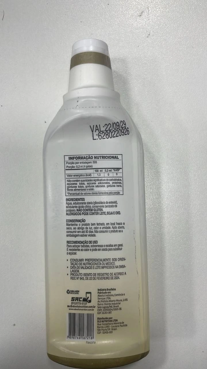 Foto original do verso da embalagem, com ingredientes, alergênicos, conservação e recomendação de uso transcritos nesta página.